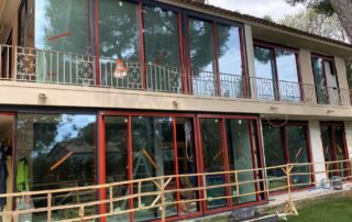 Aluminium balcony glazing system with large glass panels – custom manufacture and professional fitting by BGI.lv