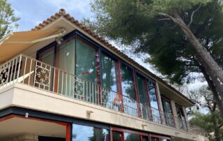 Modern aluminium sliding windows installed on a bright terrace in Nice style by BGI – durable, elegant glazing solution